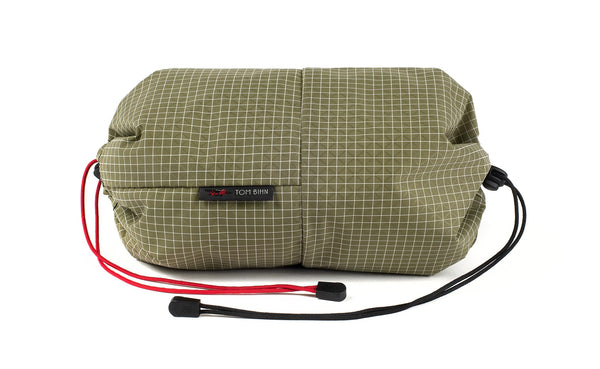 An Aeronaut 30 Travel Laundry Stuff Sack in Taiga (olive green with white grid) 200 Halcyon.